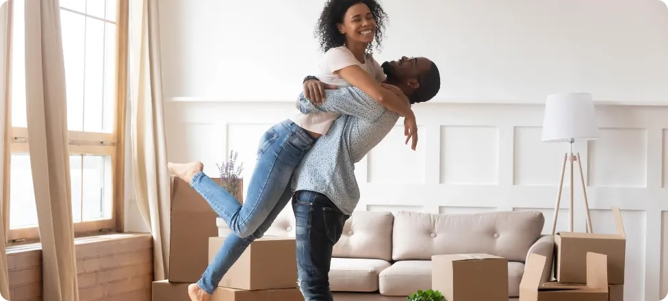 Couple Celebrate Moving Into New Home